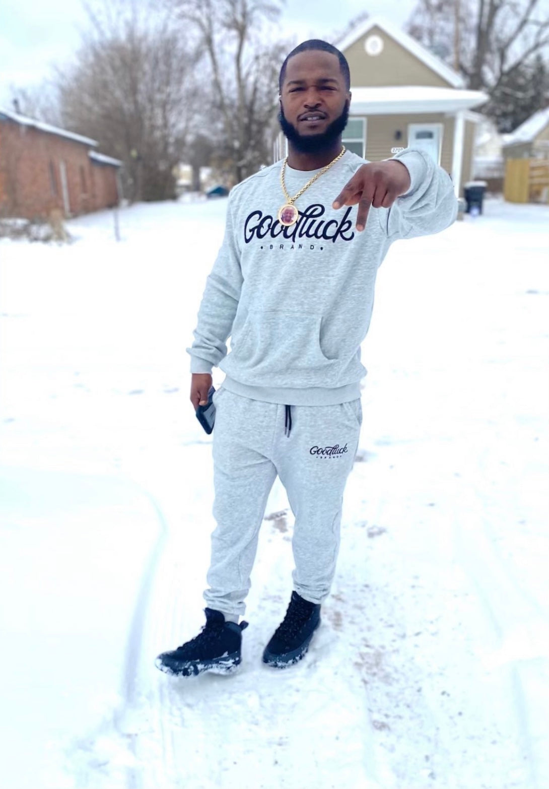 Customer Wearing The Good Luck Sweatsuit.